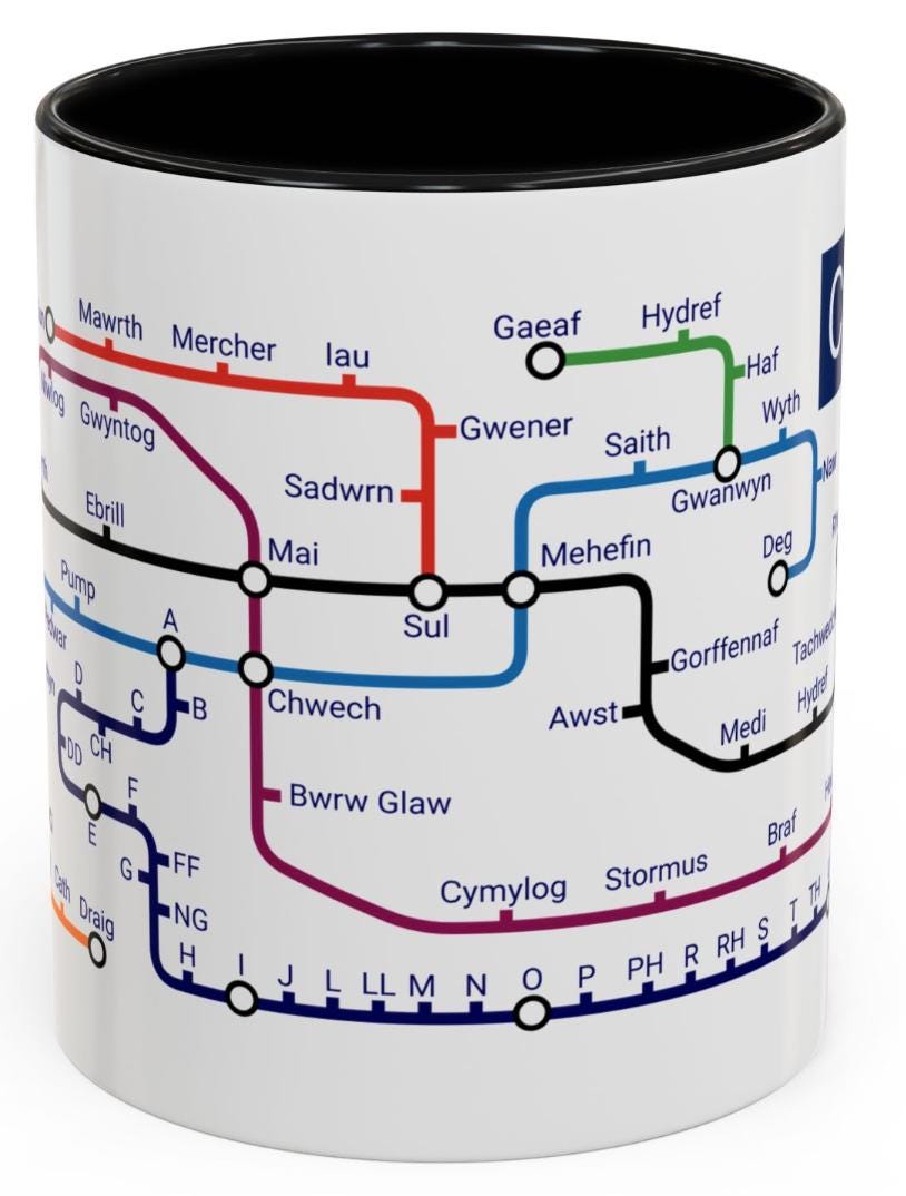 Welsh Language Learning Mug: Cymraeg Metro Design, Ceramic Coffee Cup